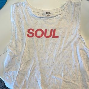 Gently worn Soul Cycle Tank top. White color with rainbow dots. Size Large